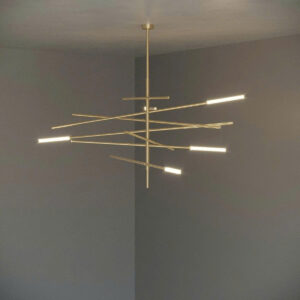 Stratum Rhythm sculptural ceiling lighting system featuring layered geometric composition in brushed champagne stainless steel with linear light elements creating atmospheric spatial rhythm